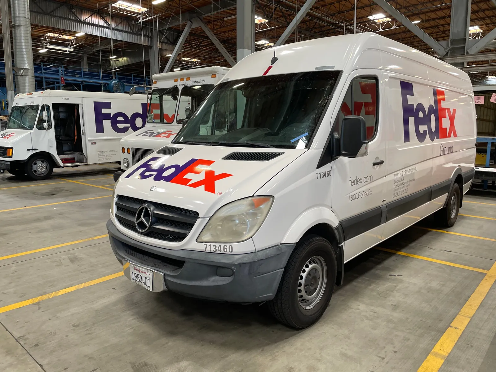 Delivery van with full-side fleet graphics installed by High Tech Vinyl